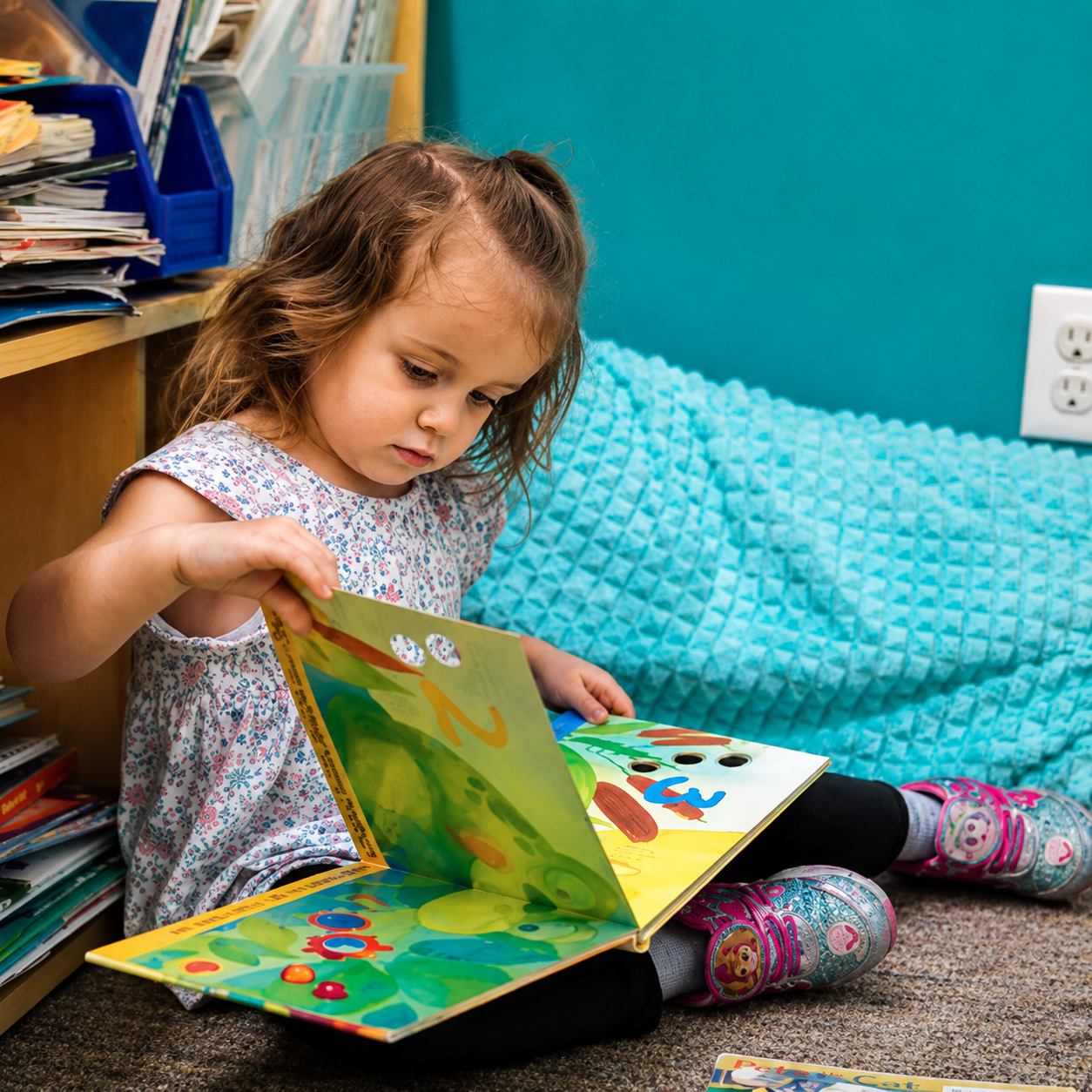 Child enjoying a creative learning activity